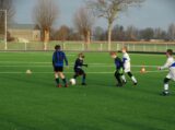 S.K.N.W.K. JO9-1 -M.O.C. '17 JO9-5 (competitie) seizoen 2021-2022 (voorjaar - 3e fase)) (19/93)